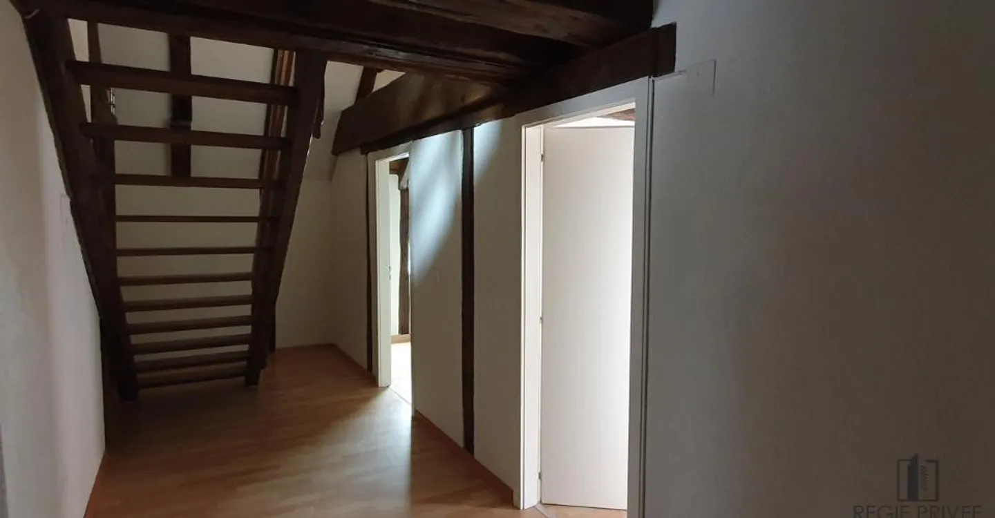 Appartement Charmant au Centre-Ville - Photo 5 sur 8