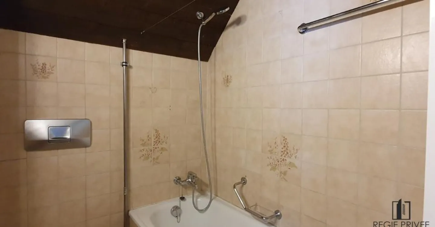 Appartement Charmant au Centre-Ville - Photo 6 sur 8