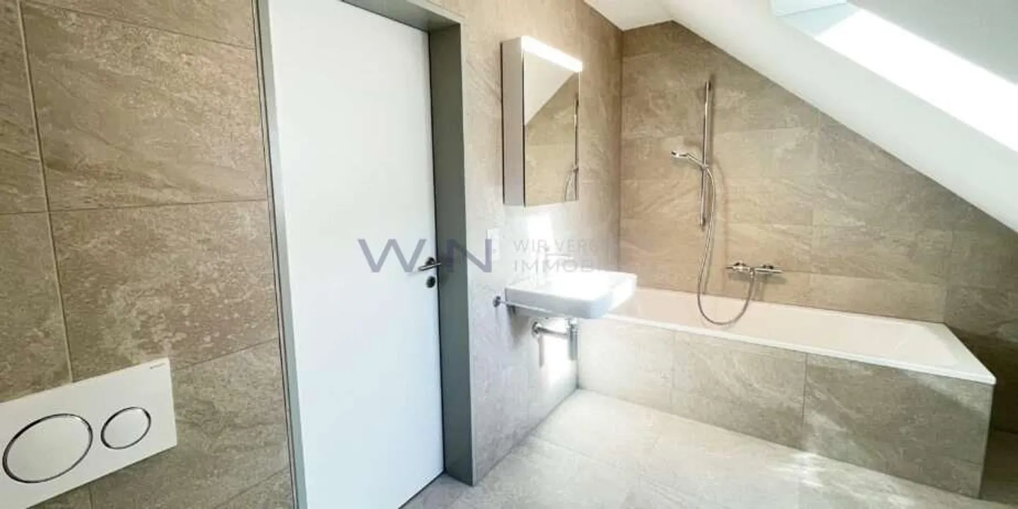 Appartement en duplex au centre du village - Photo 12 sur 13