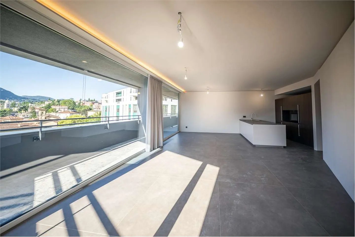 Neues Penthouse mit Seeblick in Lugano - Foto 2 von 12