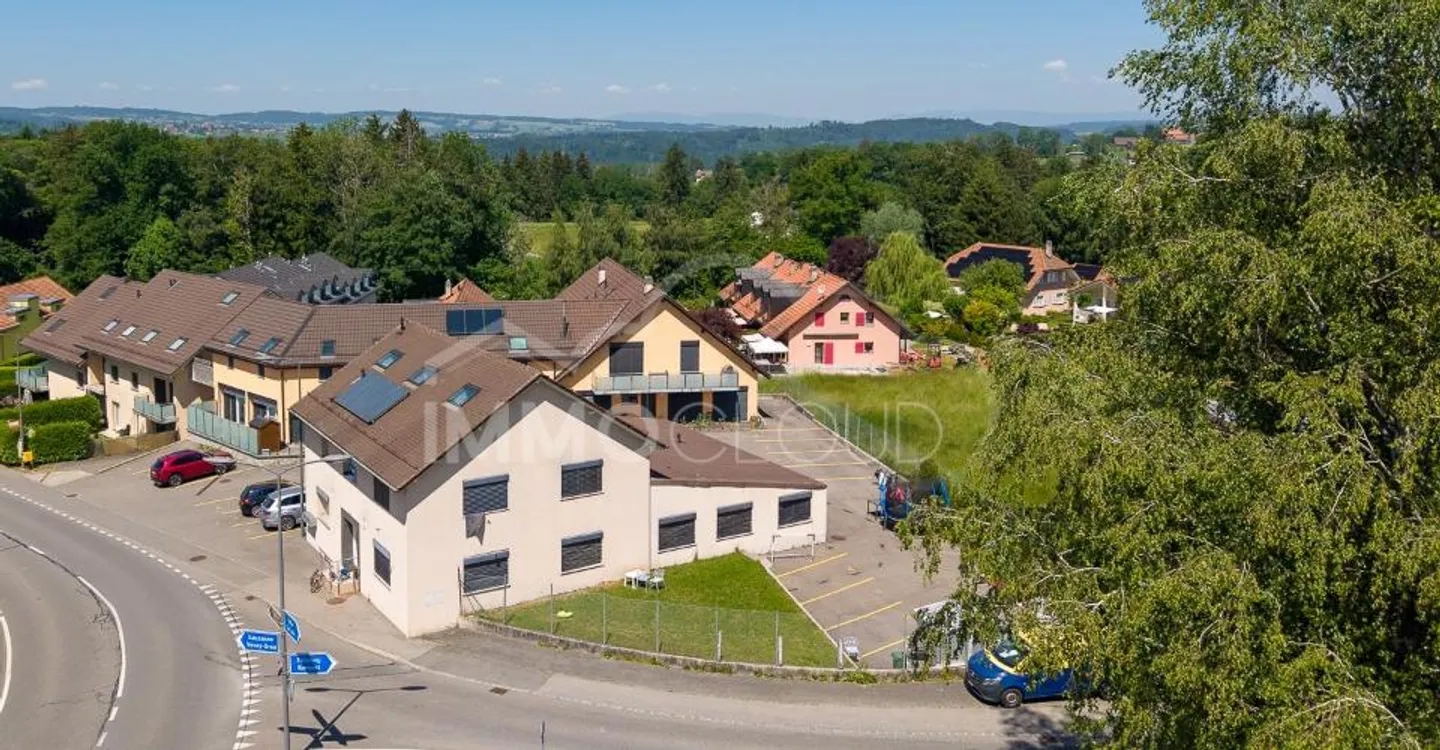 Immeuble de rendement rénové avec réserve de développement - Foto 12 von 13
