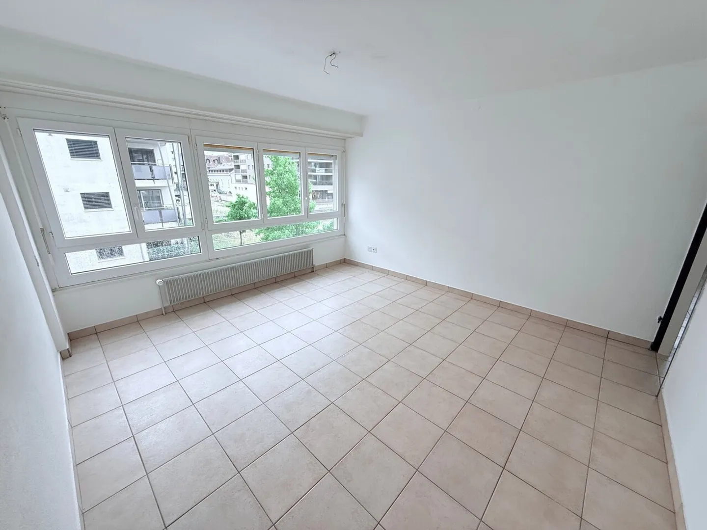 Charmant appartement 3.5 pièces - Photo 2 sur 5