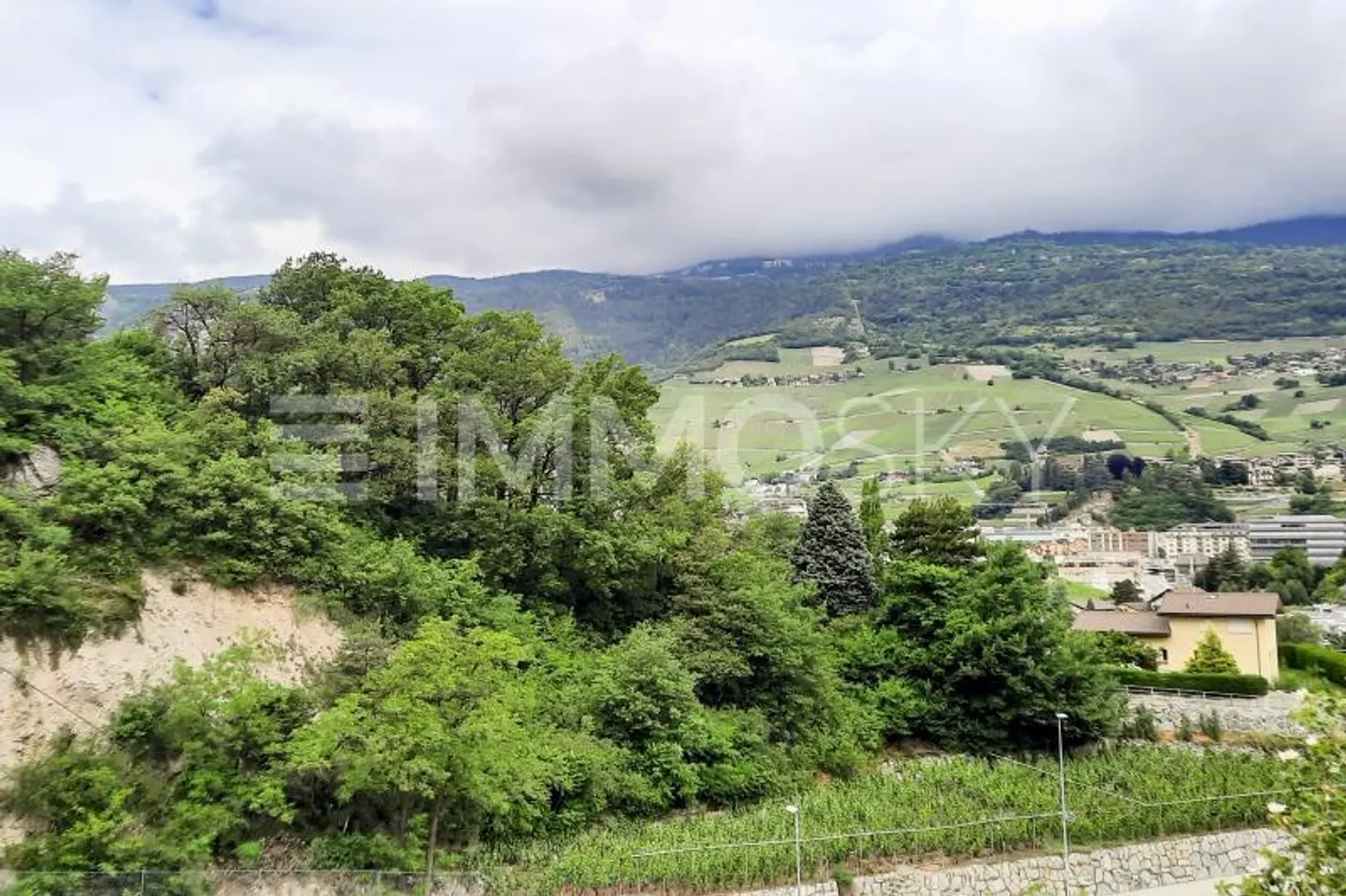 ImmoSky Exclusive: Building plot with unique view - Photo 1 of 4
