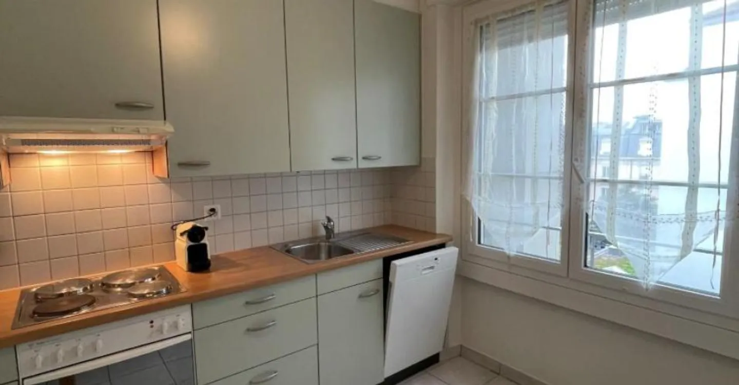 Charmant appartement 2.5 pièces - Photo 2 sur 5