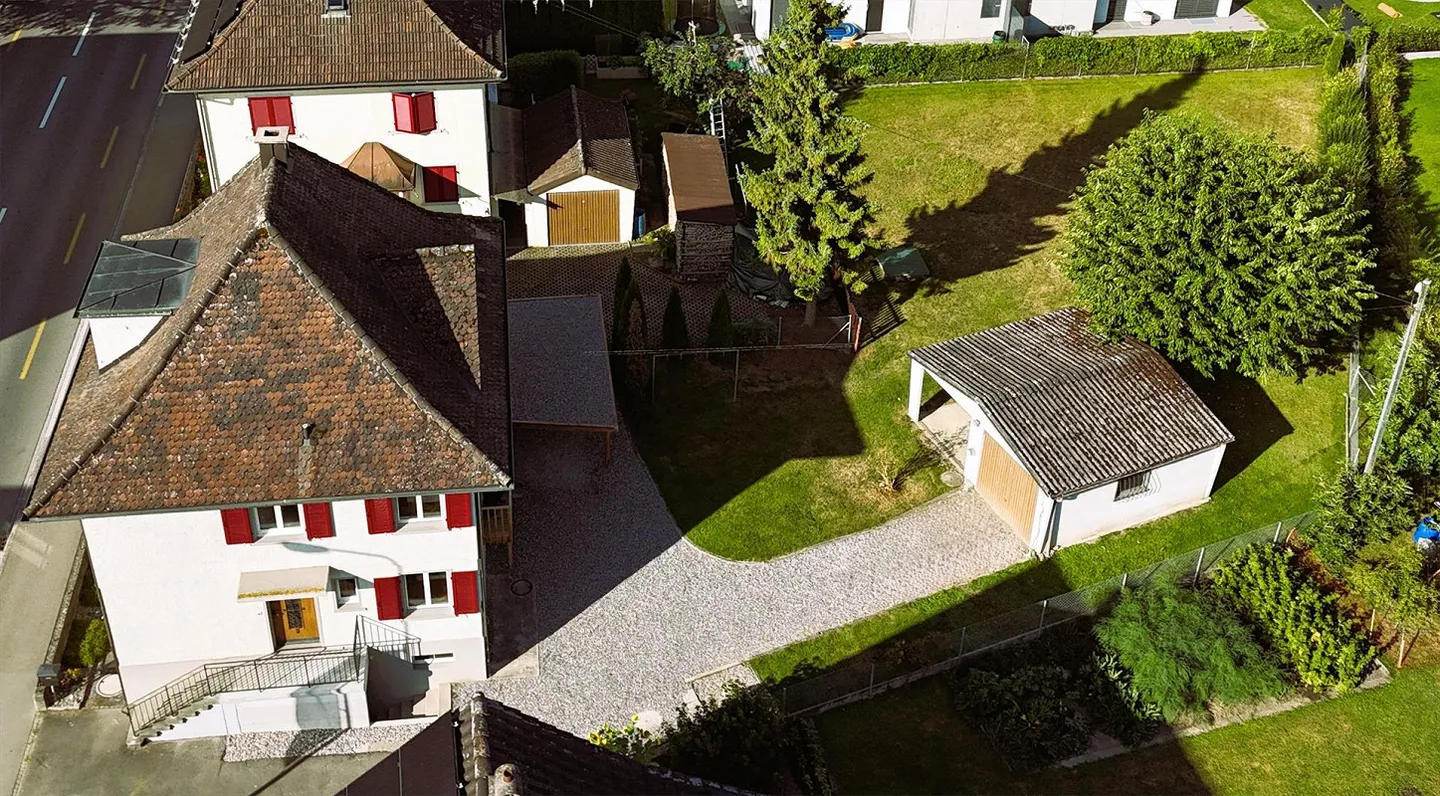 Charmantes Haus mit Bauparzelle - Foto 1 von 10