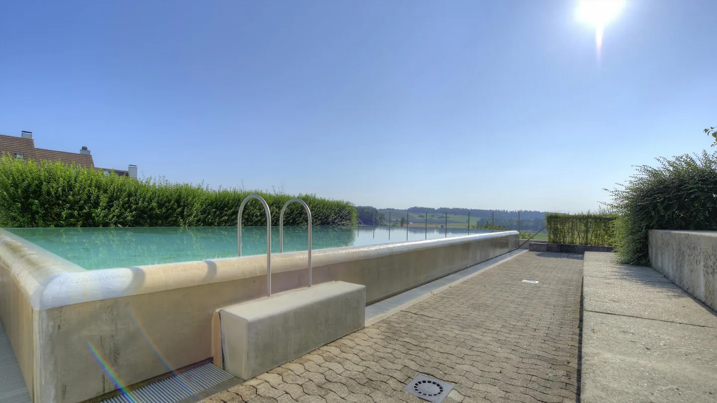 Casa a schiera adatta alle famiglie con piscina, area giochi e spazio ricreativo condiviso - Foto 3 di 12