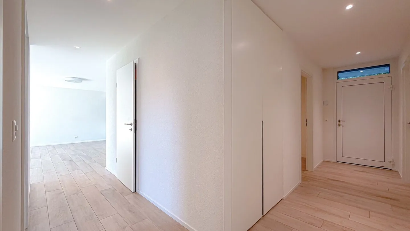 Familienwohnung mit Privatgarten - Foto 3 von 13
