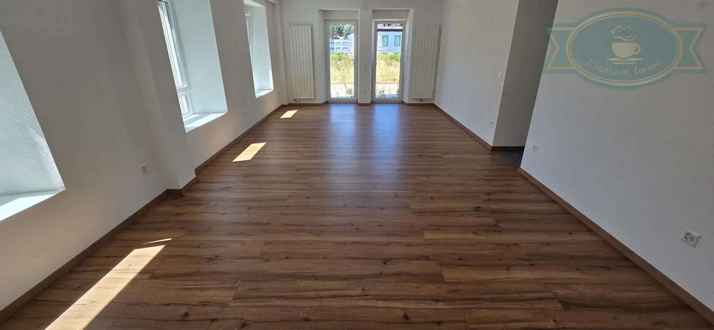 Charmant Appartement Rénové - Photo 3 sur 10