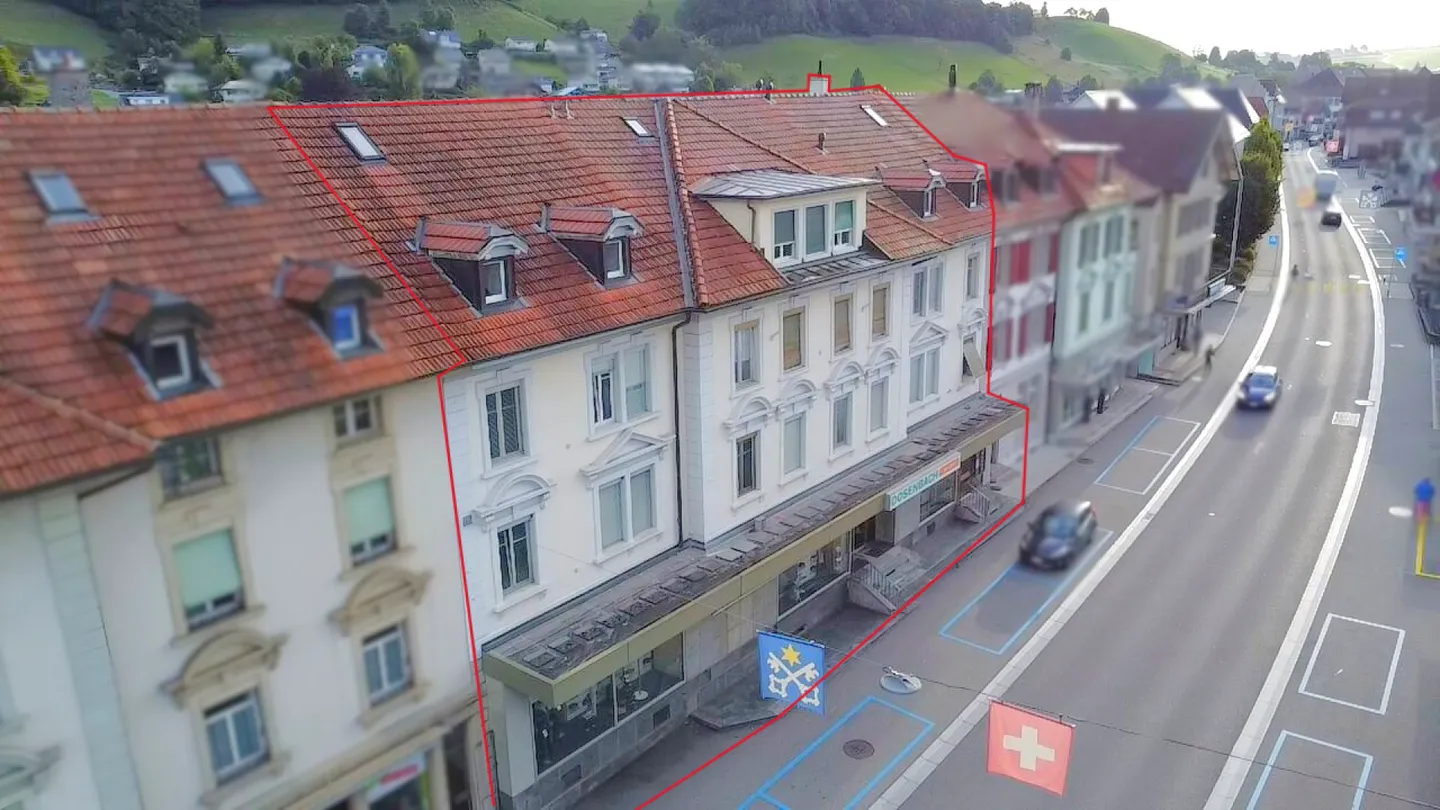 5.05% Nettorendite! Vollvermietetes Mehrfamilienhaus mit Gewerbefläche! - Foto 3 von 19