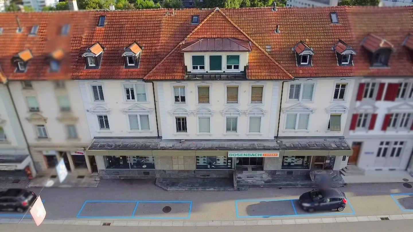 5.05% Nettorendite! Vollvermietetes Mehrfamilienhaus mit Gewerbefläche! - Foto 1 von 19