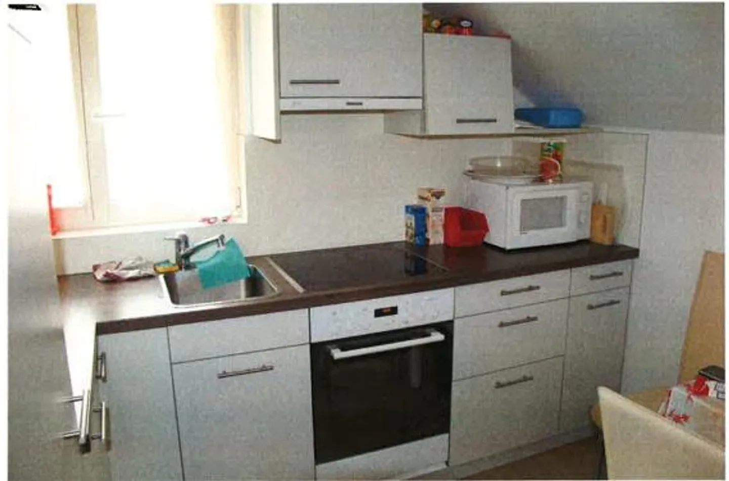 In a two-family old building - Photo 2 of 4