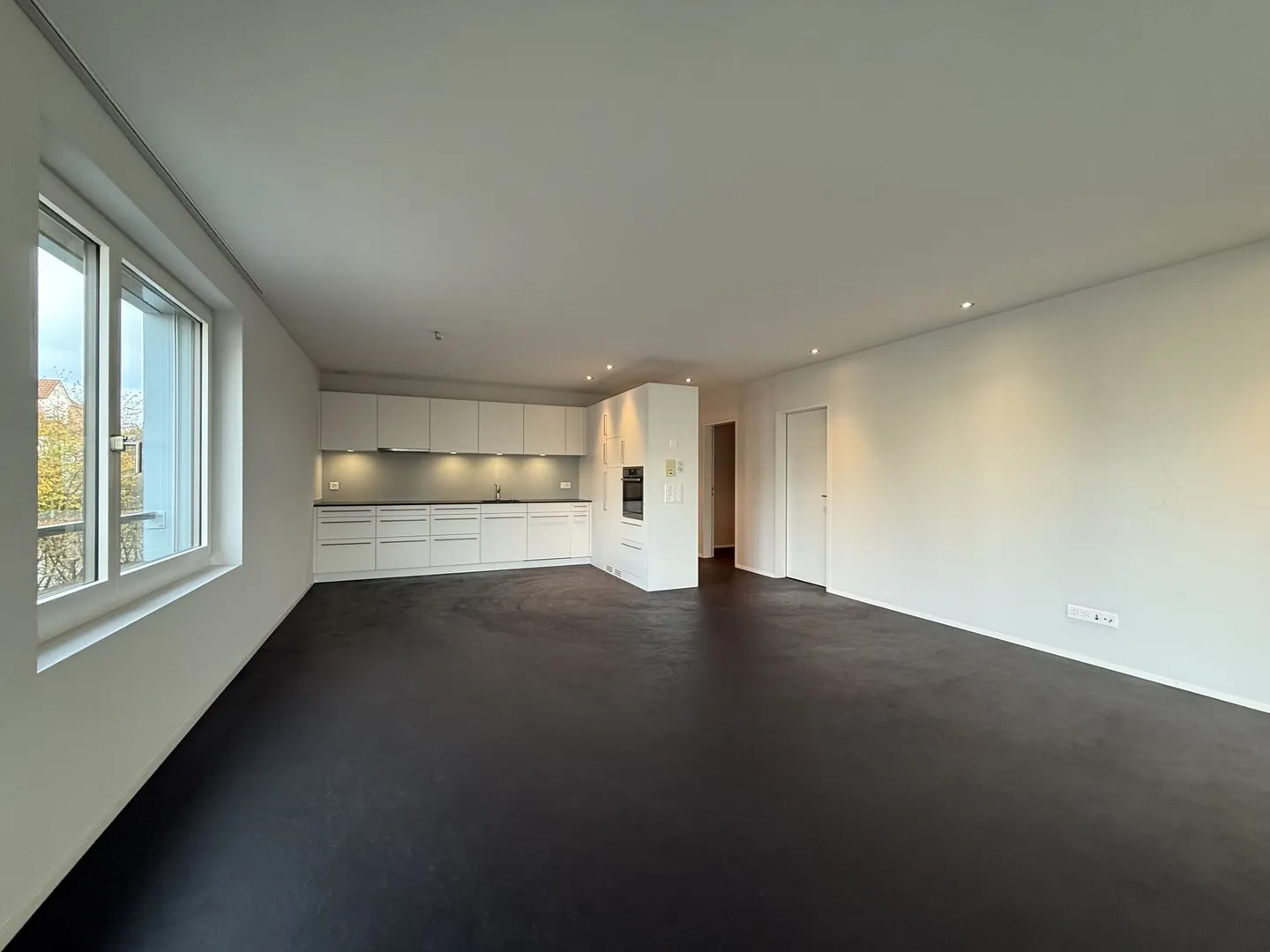 Moderne 2.5 Zimmerwohnung mitten in der Stadt und doch im Grünen - Foto 3 von 10