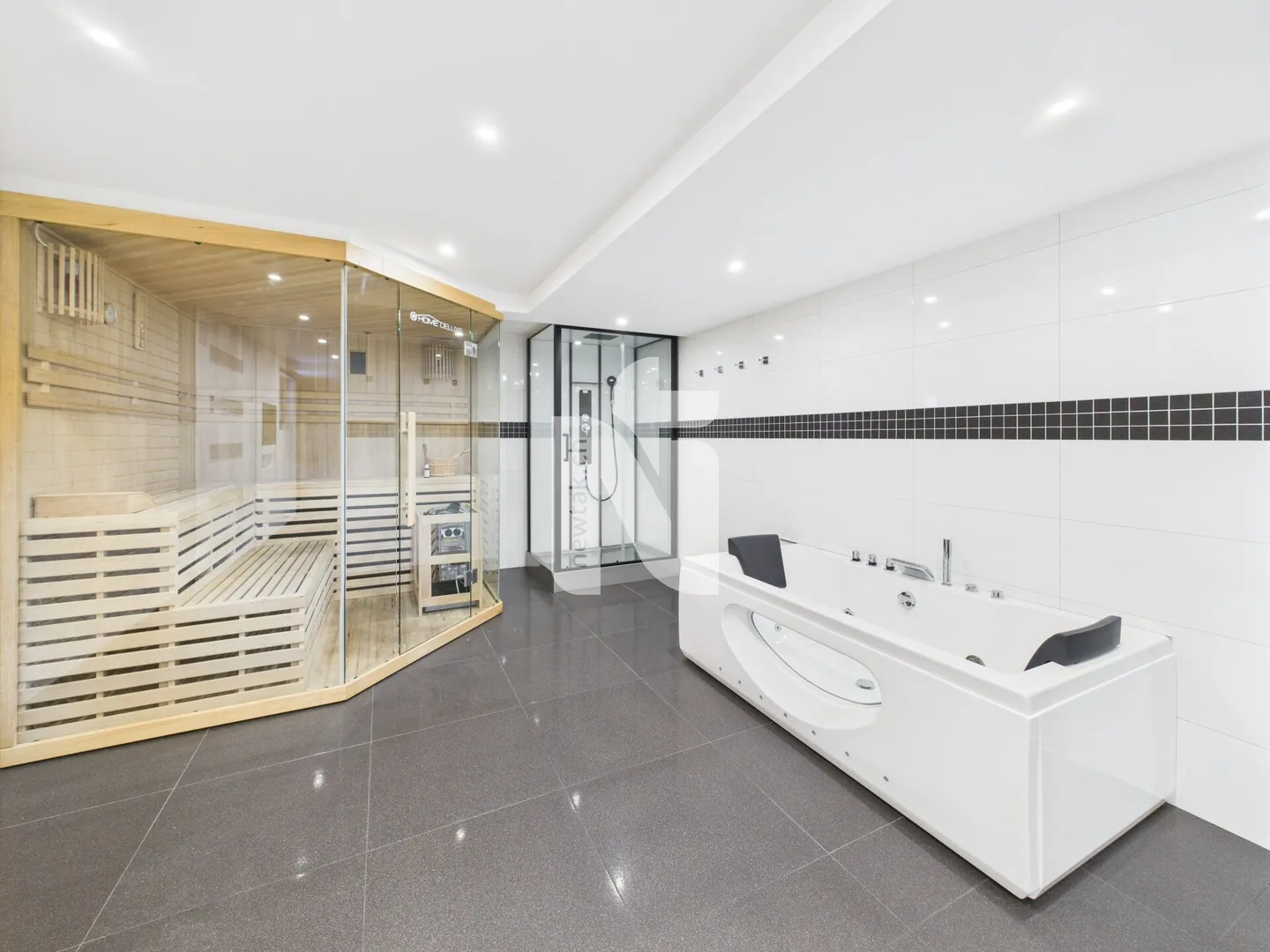 Detached 6.5-room single-family house on four floors with large garden, garage, and wellness area in a quiet, exclusive location on the Bruderholz - Photo 11 of 26