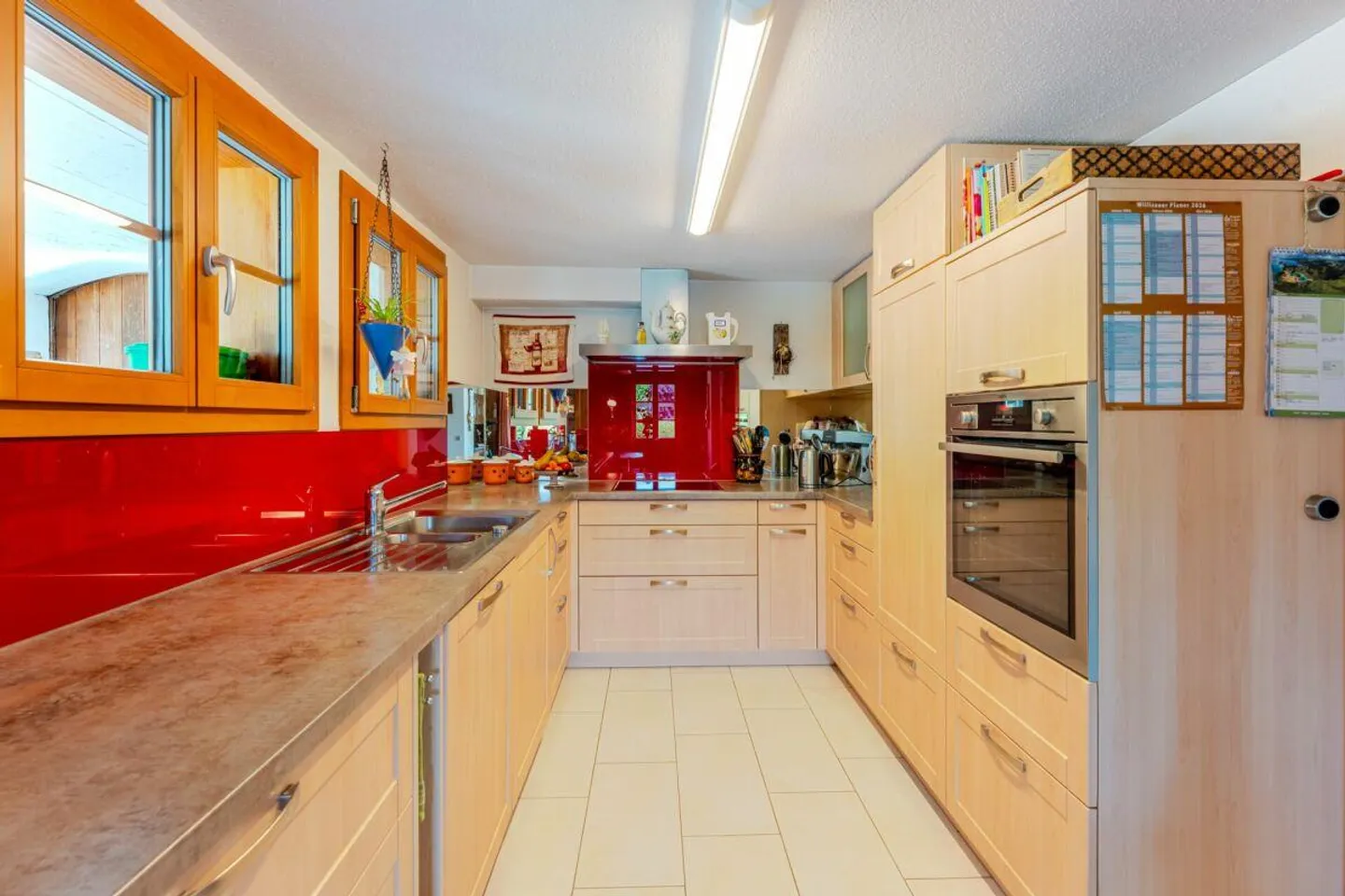 Farmhouse with 4 apartments and horse stable on spacious grounds - Photo 3 of 17