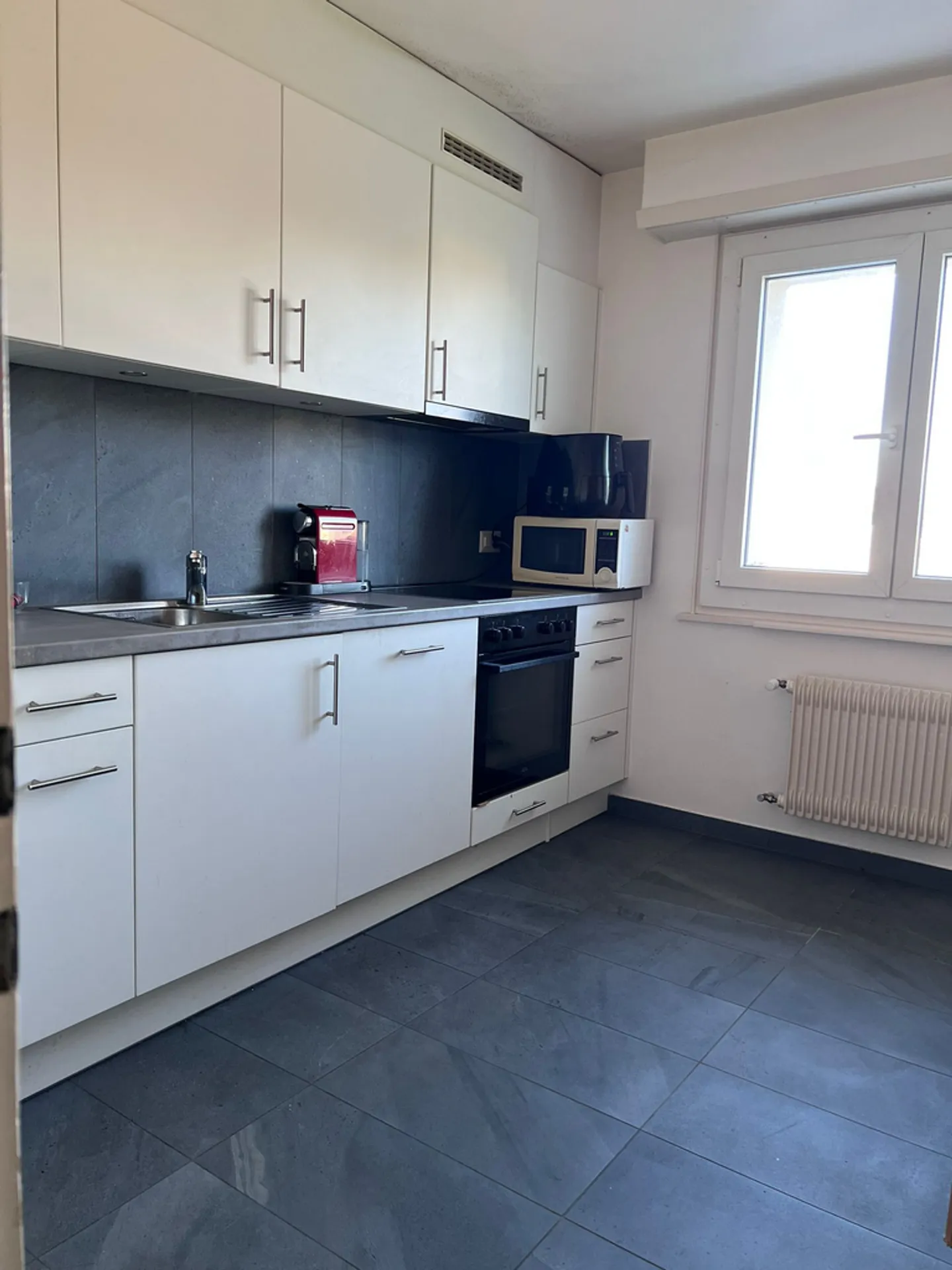 Appartement de 3,5 pièces au 3ème étage - Photo 2 sur 8