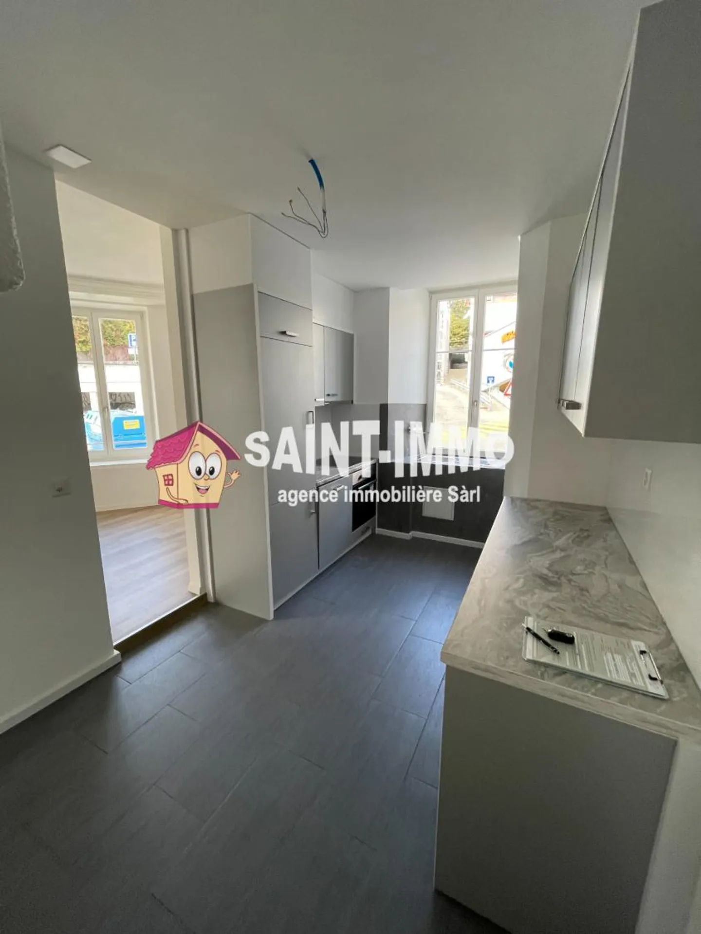 Rental building with 6 apartments and bar/restaurant in the center of Saint-Imier - Photo 2 of 7