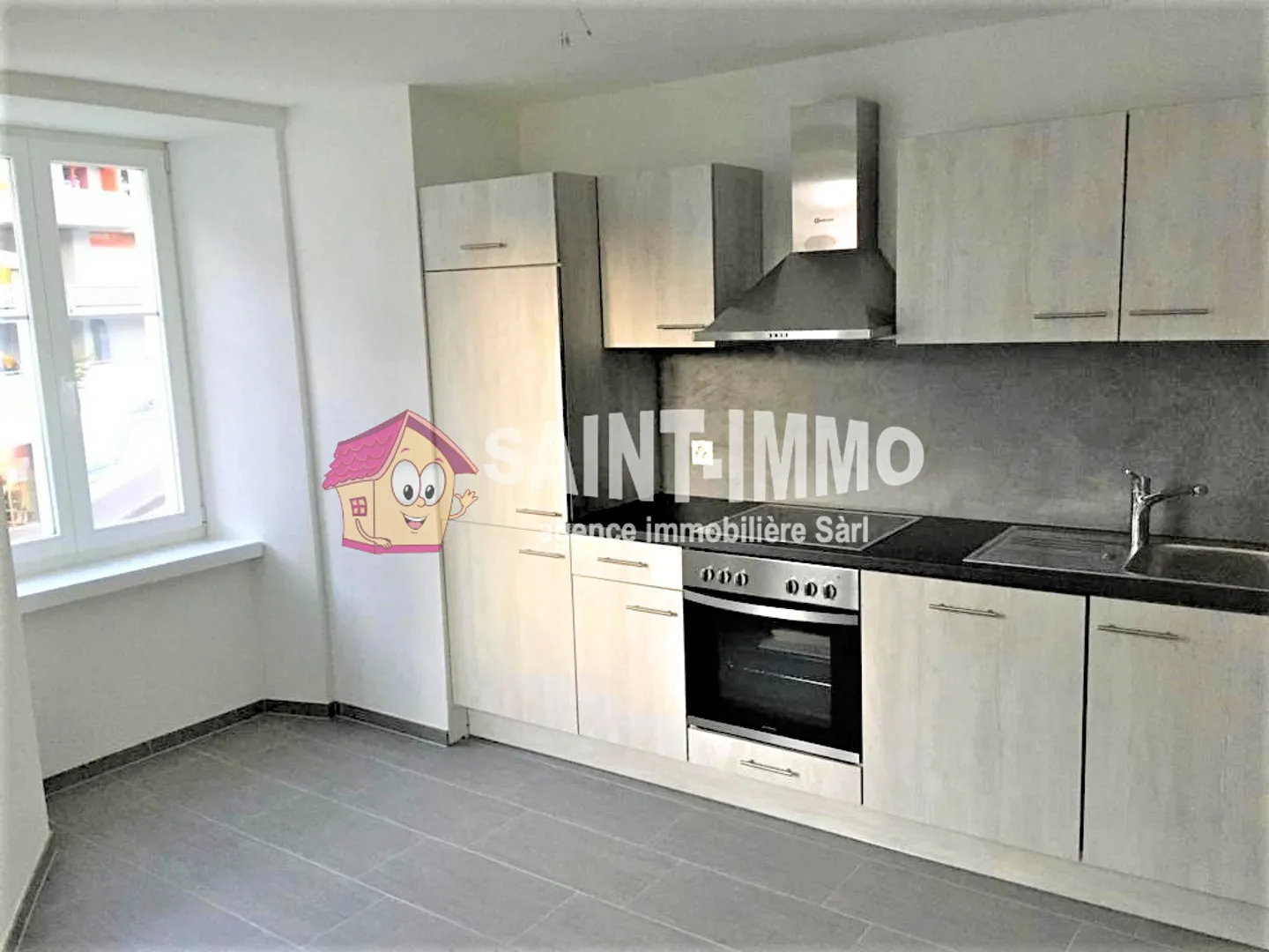 Rental building with 6 apartments and bar/restaurant in the center of Saint-Imier - Photo 5 of 7