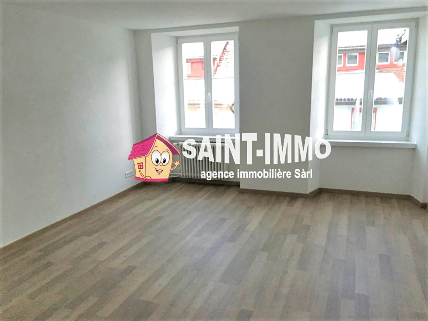 Rental building with 6 apartments and bar/restaurant in the center of Saint-Imier - Photo 6 of 7