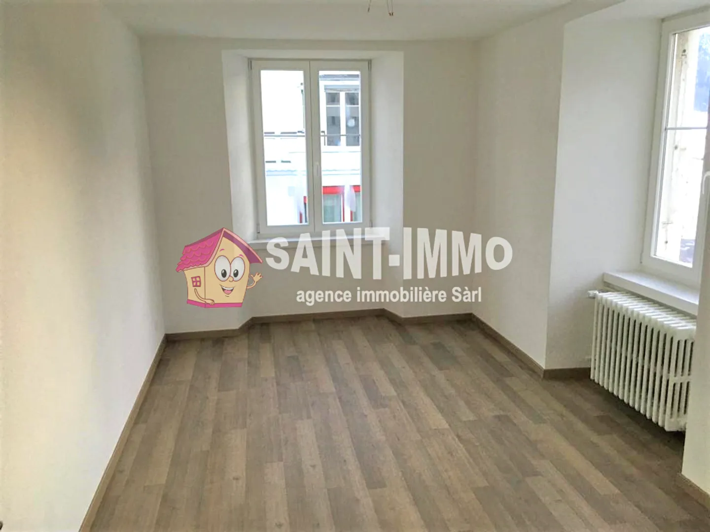 Rental building with 6 apartments and bar/restaurant in the center of Saint-Imier - Photo 4 of 7