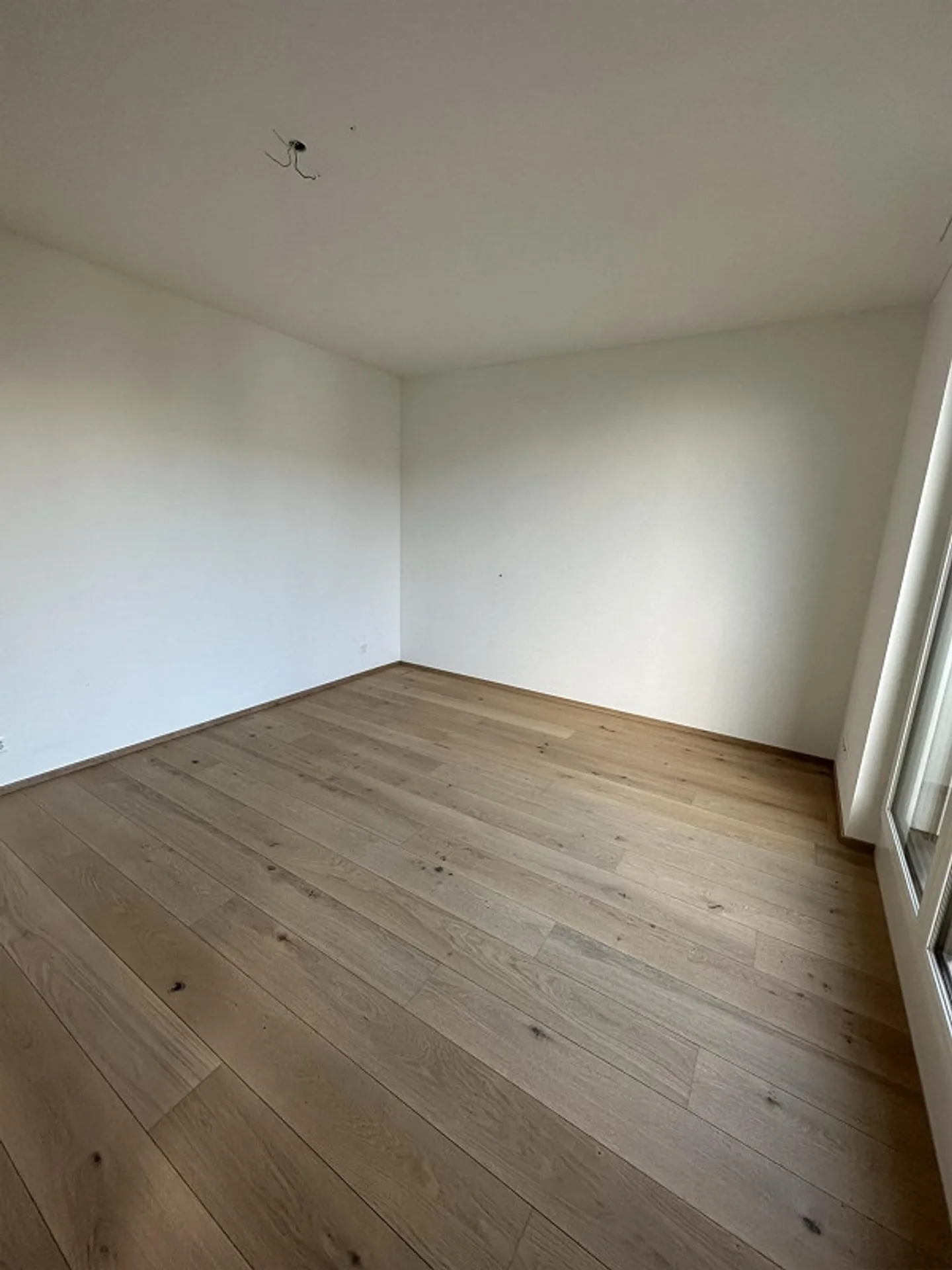 Modern 2.5-room apartment with unique room height - Photo 2 of 7