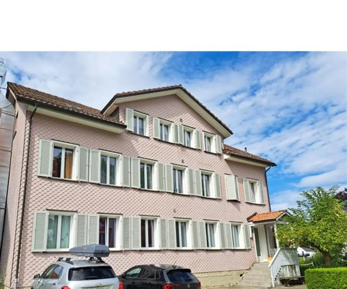 Attractive 3-Family House with Commercial Space and Lake View in Lutzenberg - Photo 1 of 13