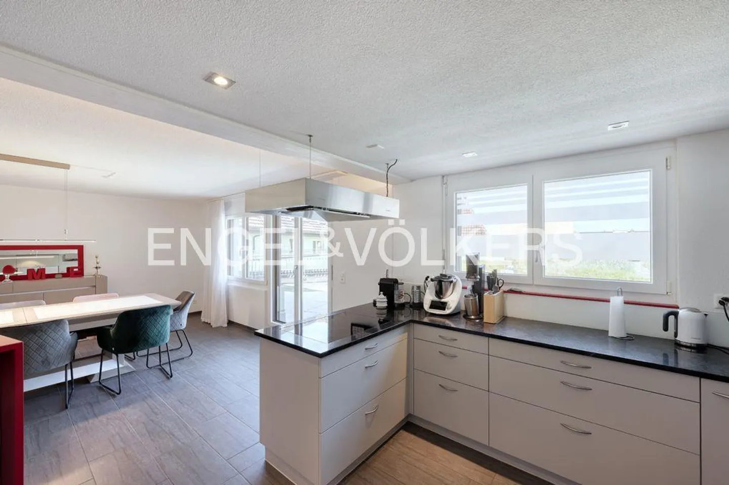 Central Location Meets Space Wonder: Stylish Living in the Village Center - Photo 4 of 10