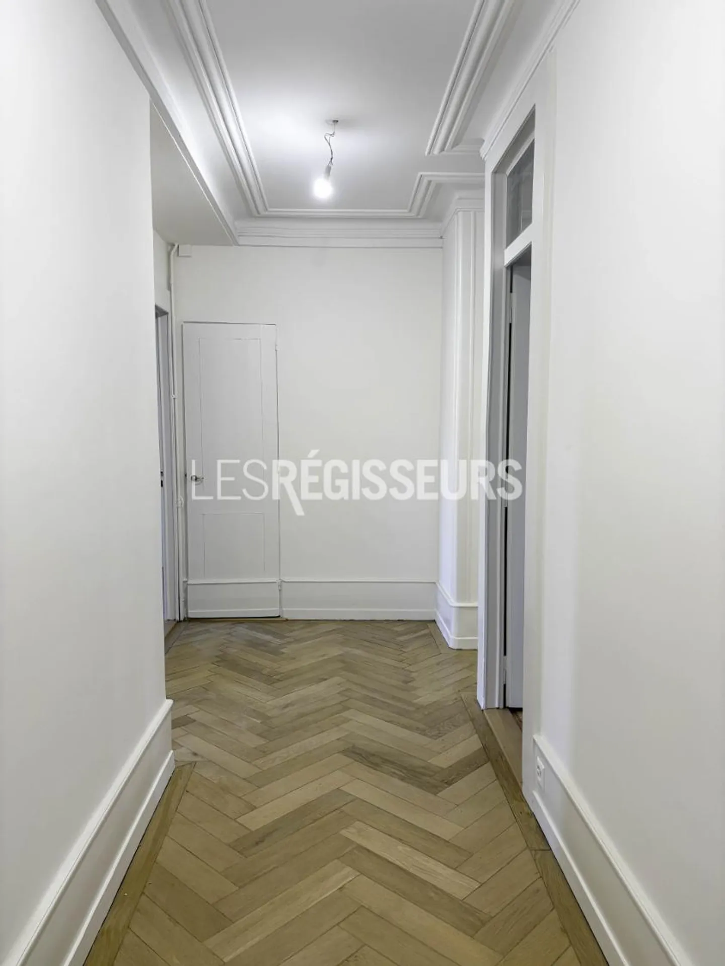 Appartement haussmannien charmant - Photo 2 sur 9