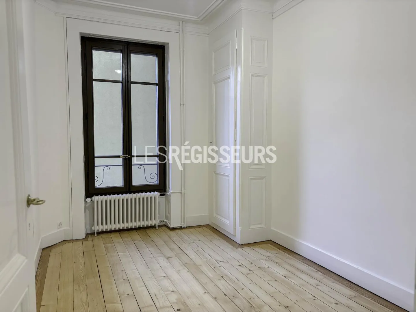 Appartement haussmannien charmant - Photo 5 sur 9