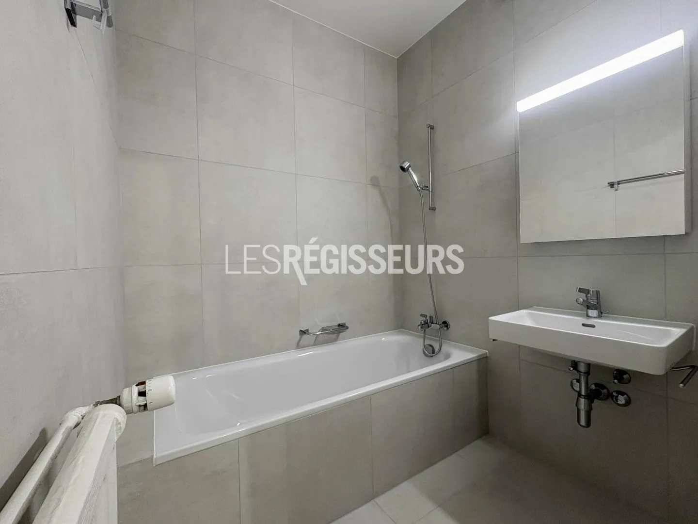 Appartement haussmannien charmant - Photo 6 sur 9