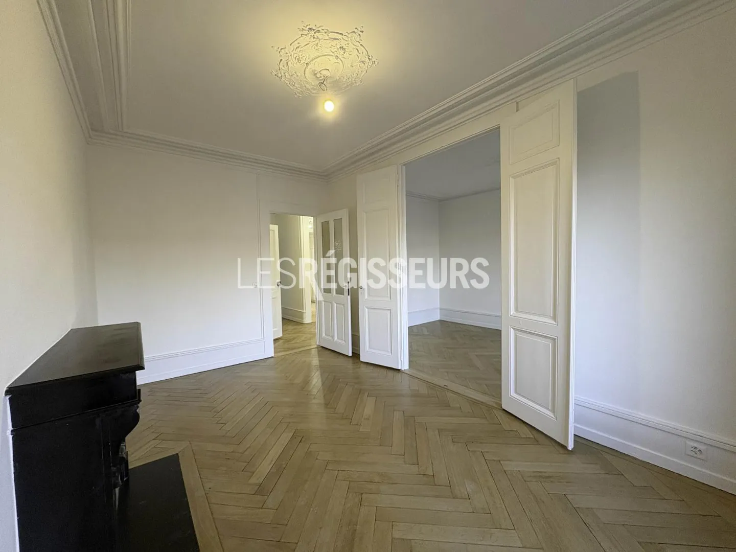 Appartement haussmannien charmant - Photo 8 sur 9