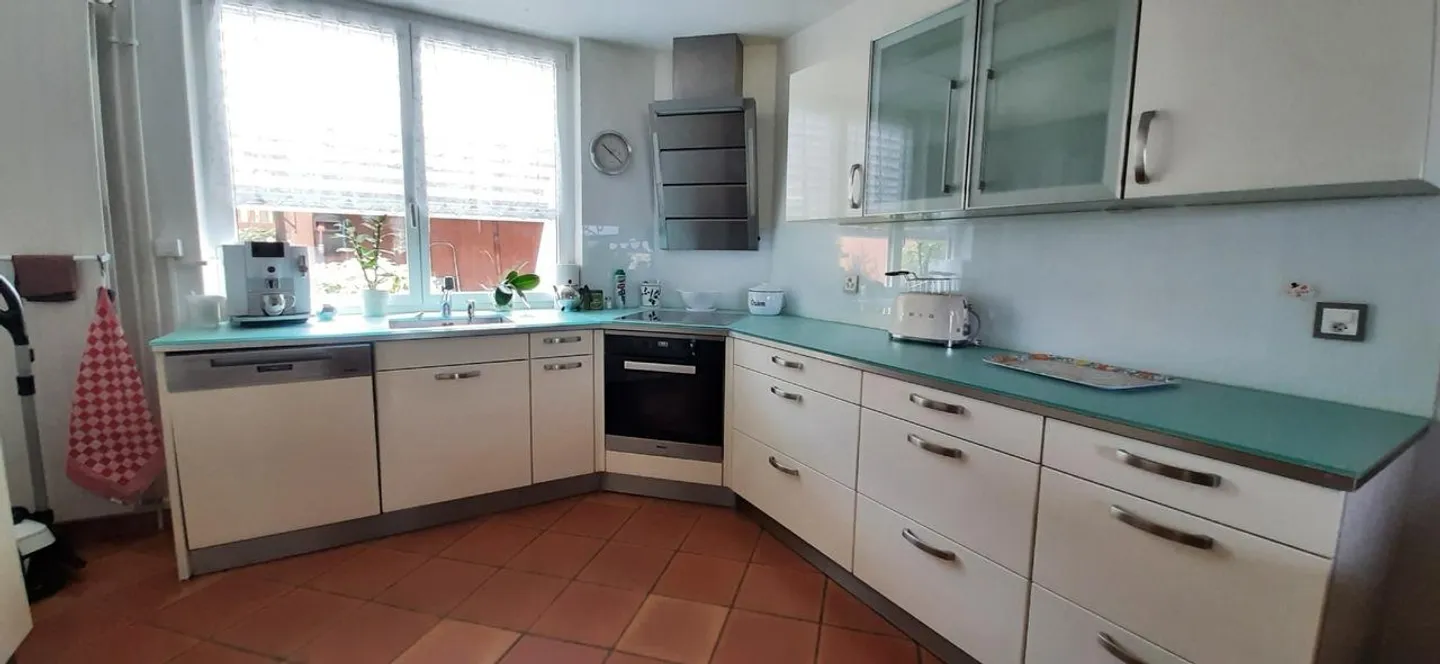 Maison Pratique dans un Quartier Familial - Photo 4 sur 9