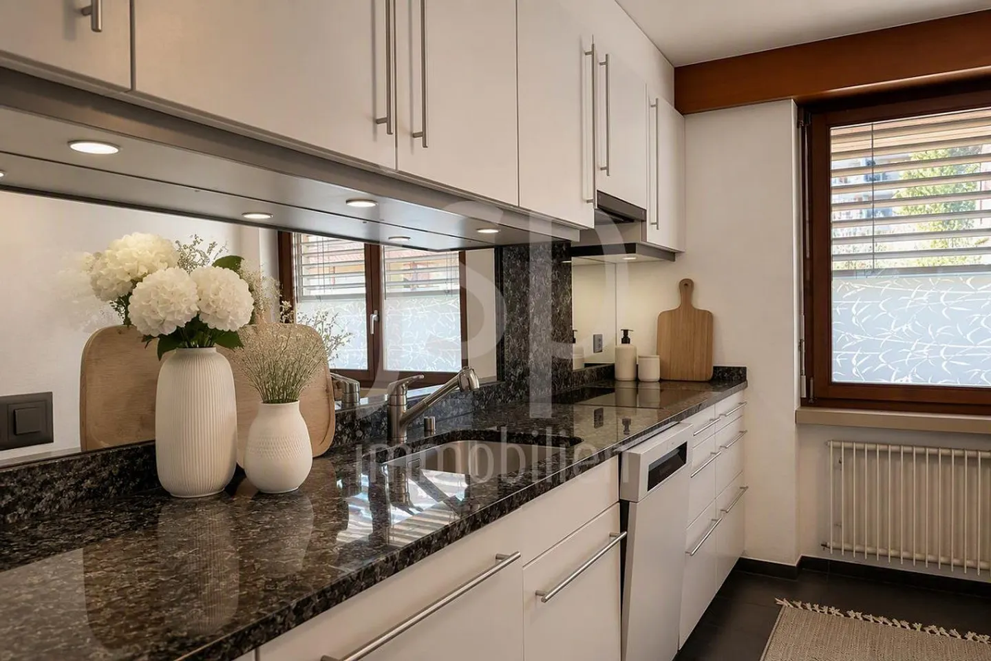 A practical 3.5 room apartment directly at the train station in Niederscherli - Photo 3 of 14