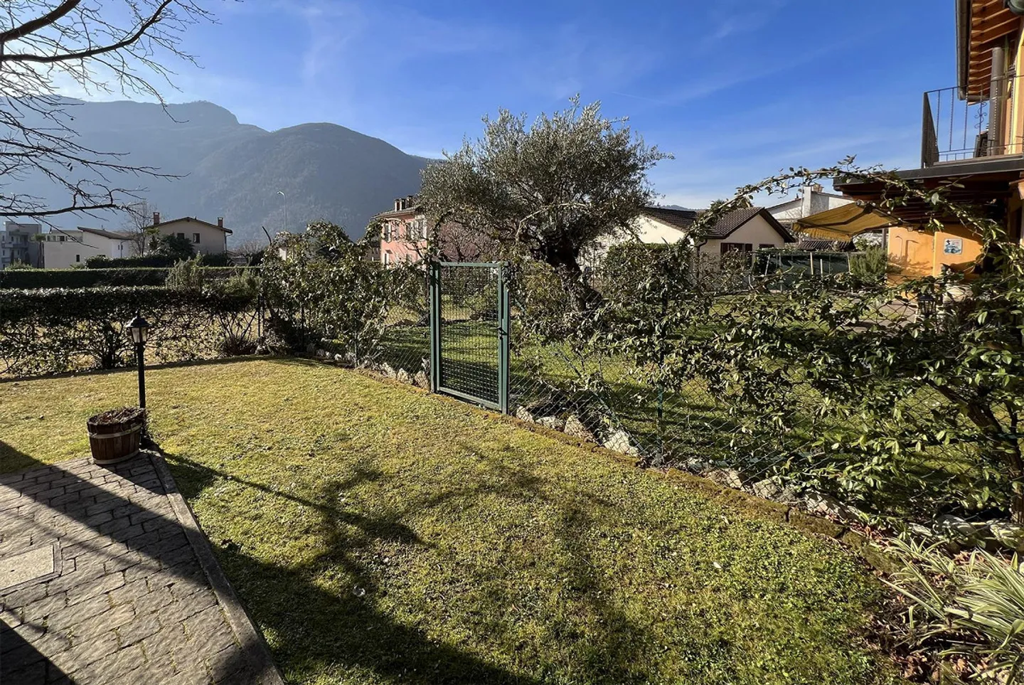 Belle maison 5.5 pièces avec grand jardin à Melano - Photo 6 sur 11