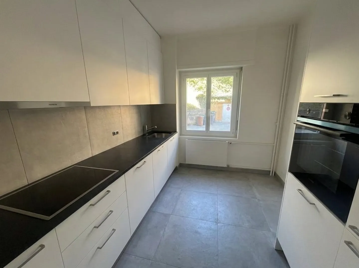 Charmant appartement 2.5 pièces - Photo 2 sur 7