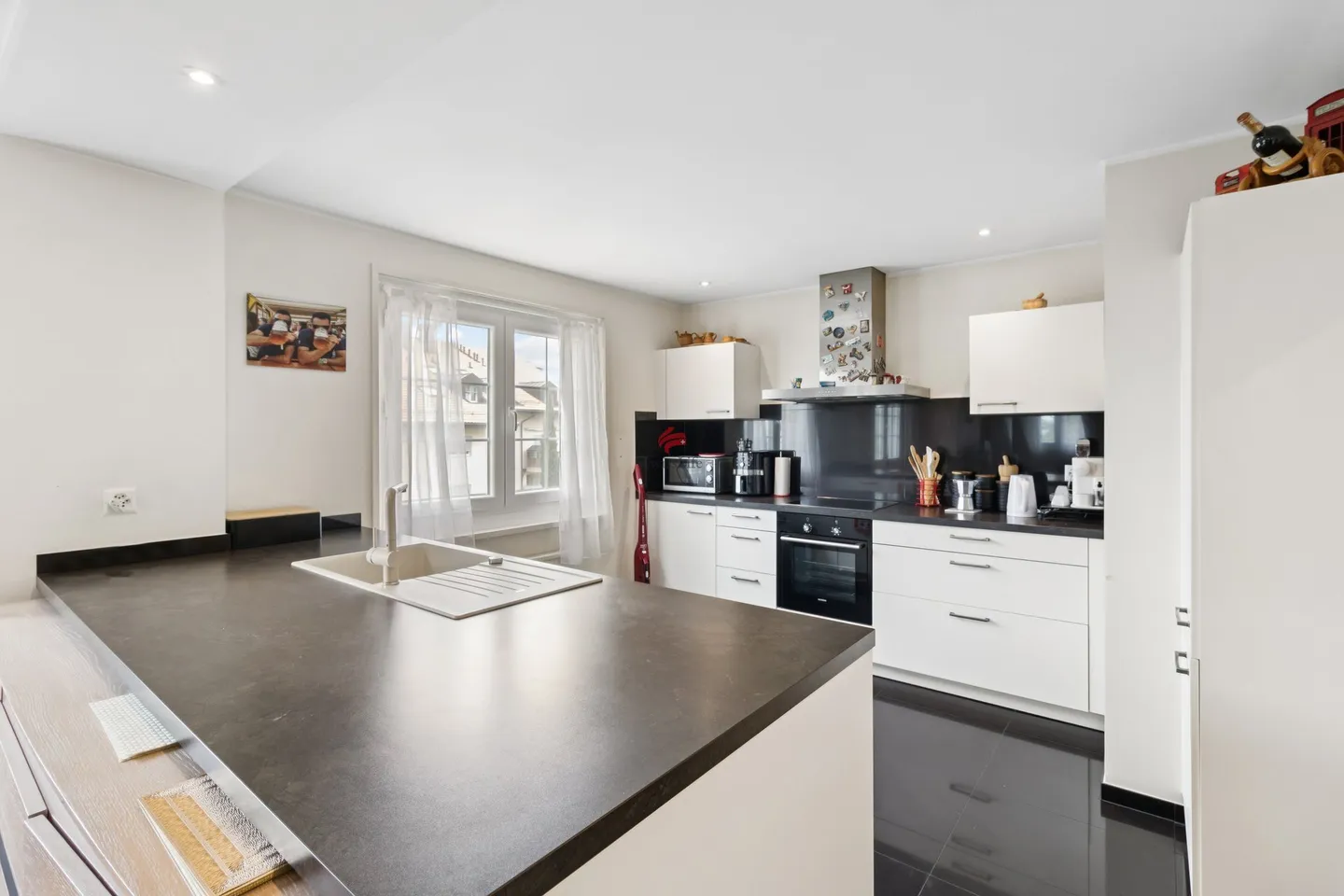 Dans le grenier avec caractère : appartement de 4,5 pièces de qualité - Photo 3 sur 10