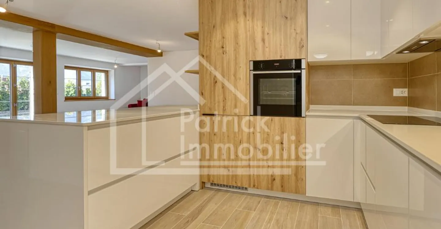 Geräumige 5,5-Zimmer-Wohnung mit 100 m² Terrasse - Foto 4 von 12