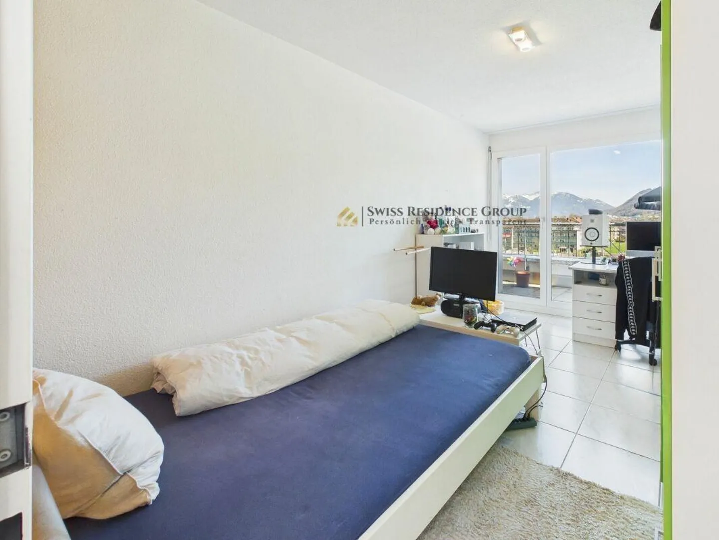 Appartamento attico luminoso con una vista splendida sulle montagne e sul lago - Foto 10 di 22