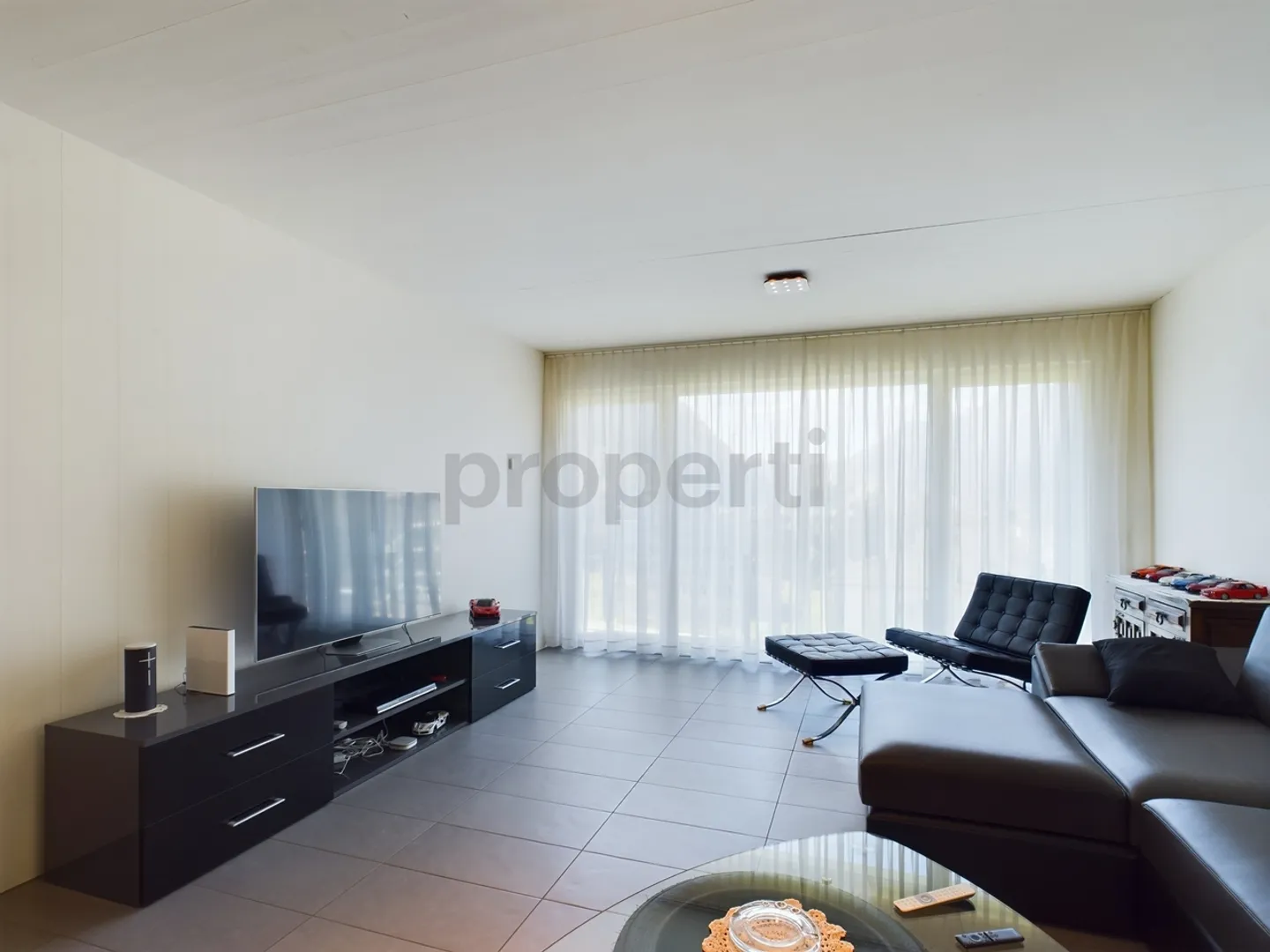 Modern 3.5-room apartment with garage in Biasca - Photo 1 of 11