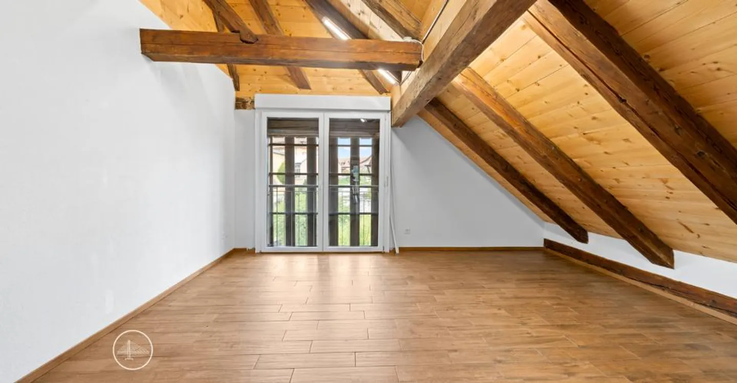 Charmante Dachgeschosswohnung mit Aussicht - Foto 11 von 11