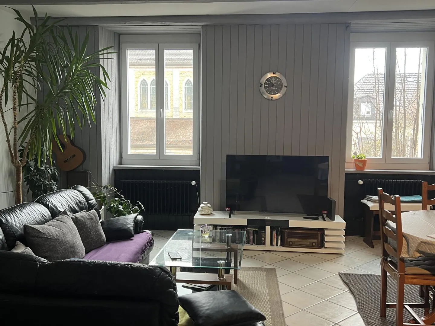 Charmant appartement 4 pièces au rez-de-chaussée surélevé à La Chaux-de-Fonds - Photo 3 sur 11