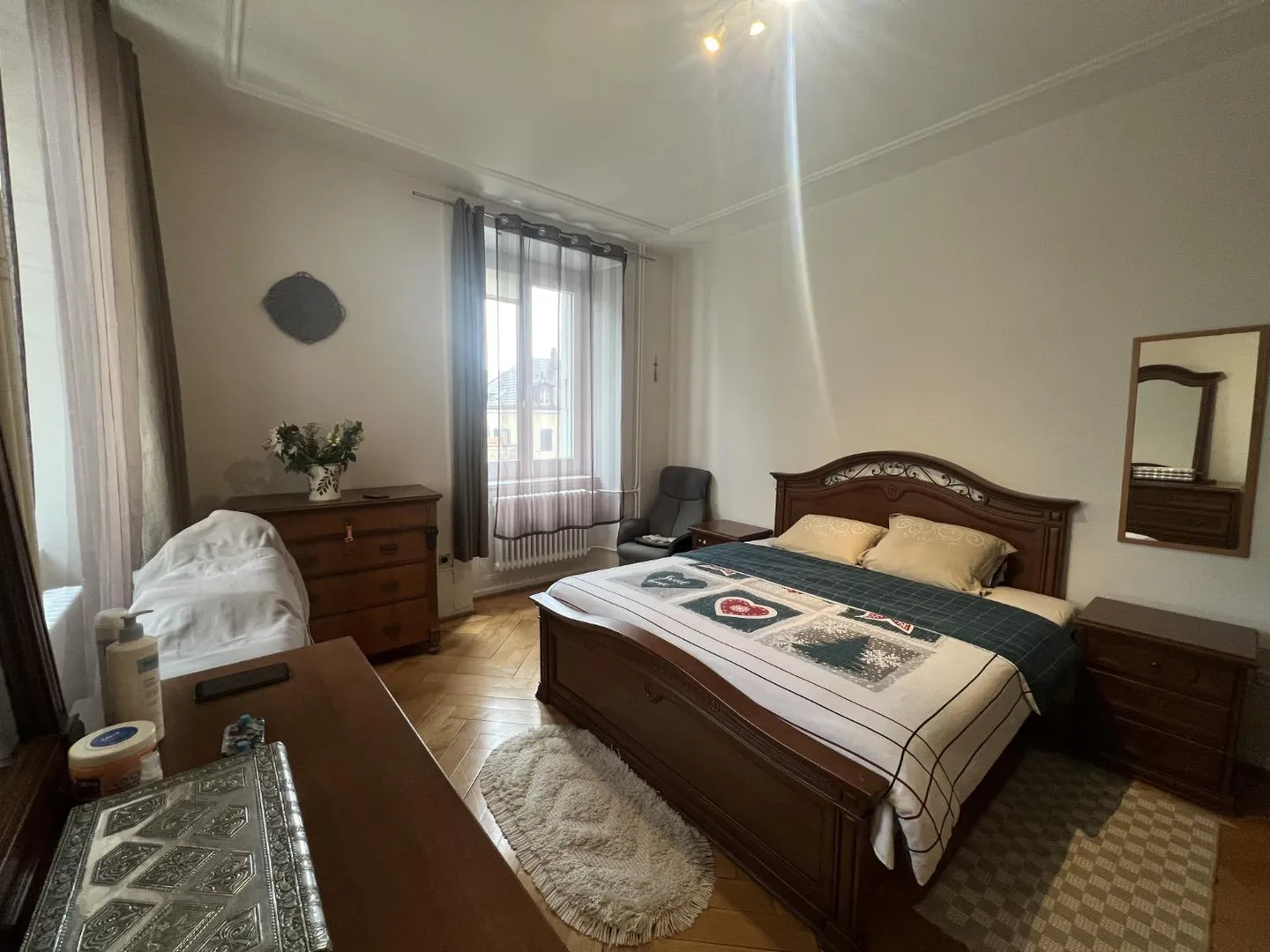 Charmant appartement 4 pièces au rez-de-chaussée surélevé à La Chaux-de-Fonds - Photo 7 sur 11
