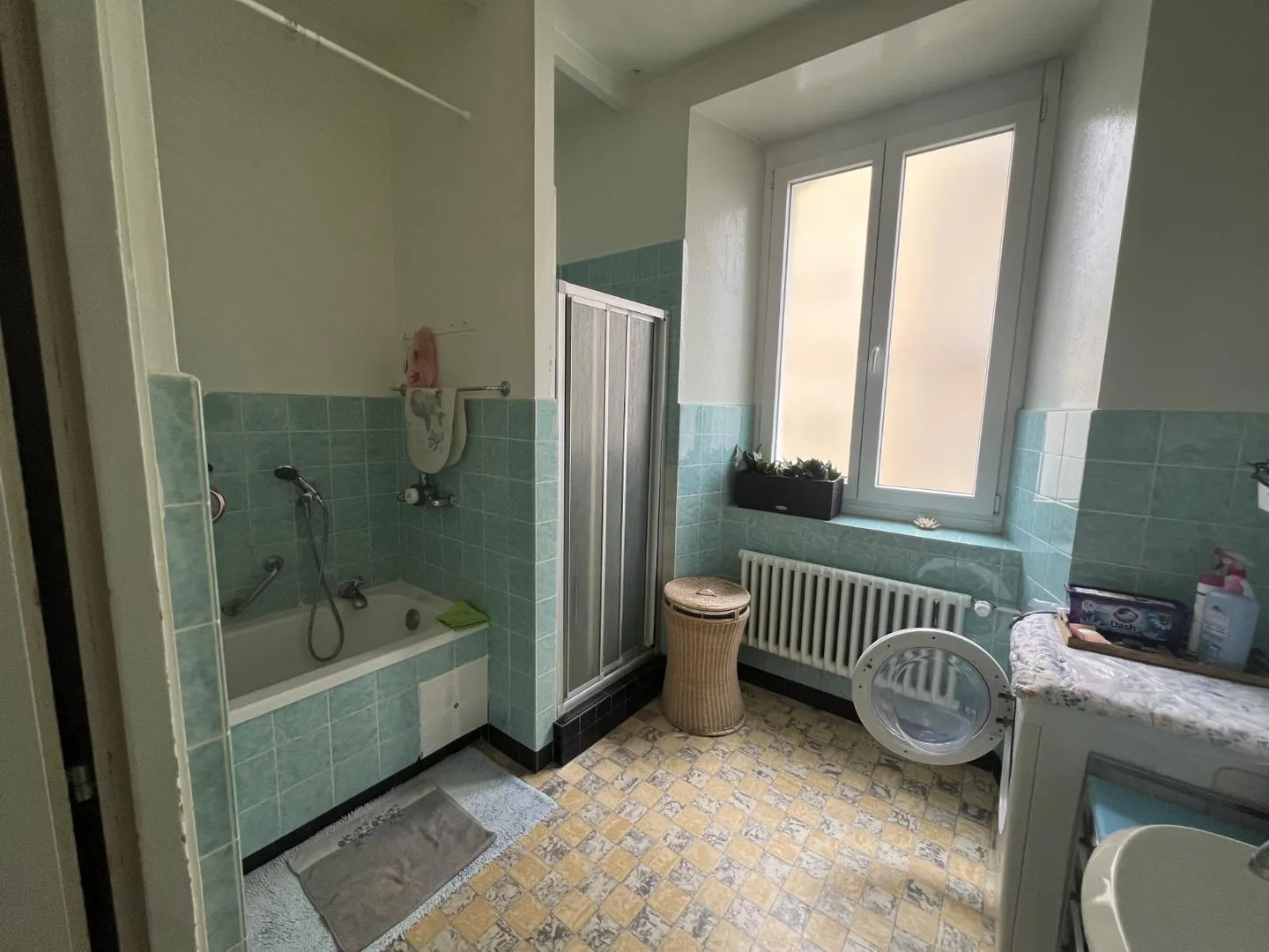 Charmant appartement 4 pièces au rez-de-chaussée surélevé à La Chaux-de-Fonds - Photo 10 sur 11