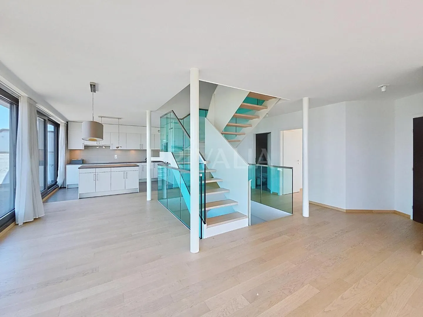 Exceptional duplex penthouse offering a panoramic view of the lake and the mountains - Photo 1 of 11