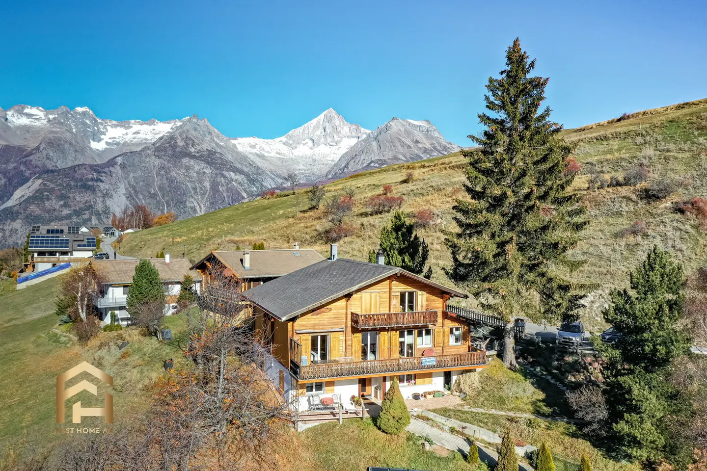 Partially renovated chalet with 4 residential units for sale in Bürchen - Photo 1 of 13