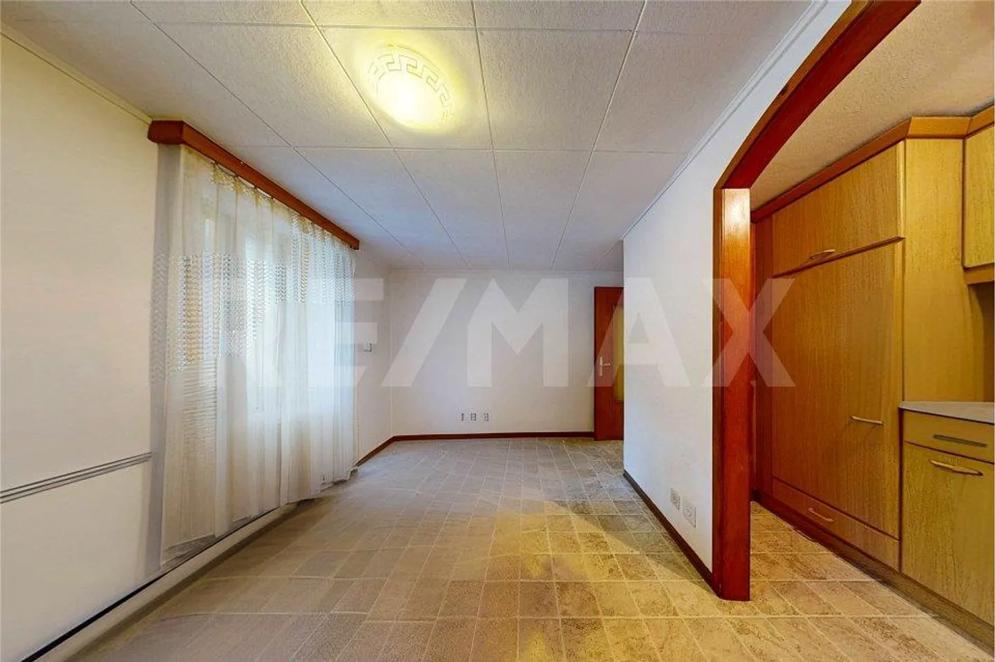 Maison avec 3 appartements et magasin - Photo 8 sur 13
