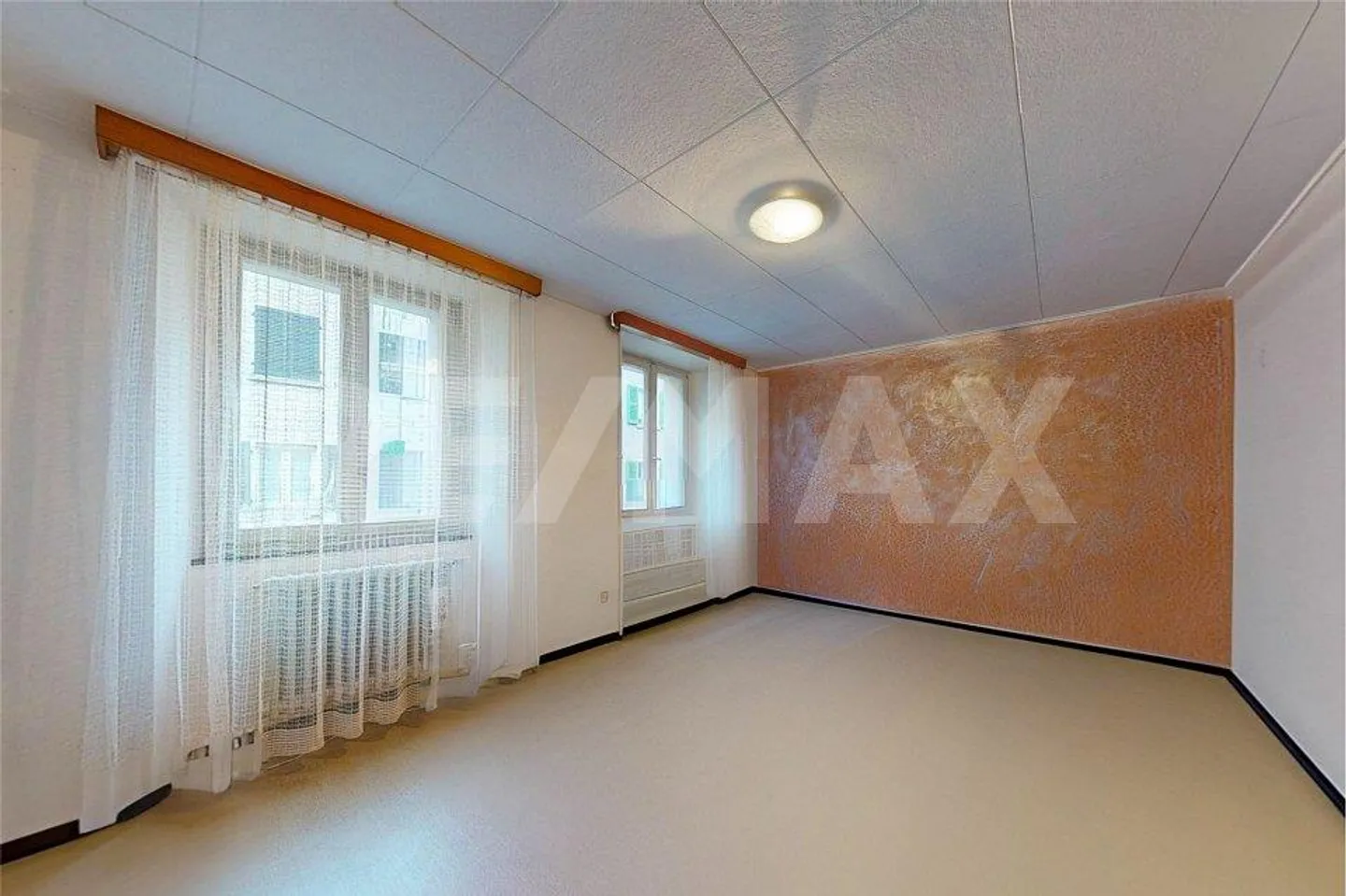 Maison avec 3 appartements et magasin - Photo 10 sur 13