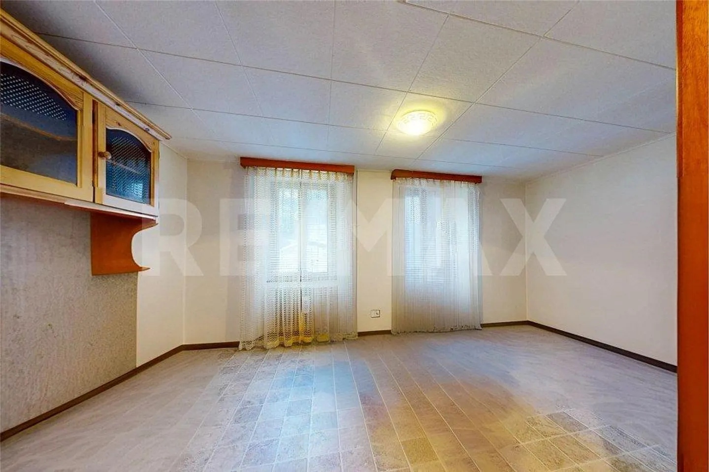 Maison avec 3 appartements et magasin - Photo 12 sur 13