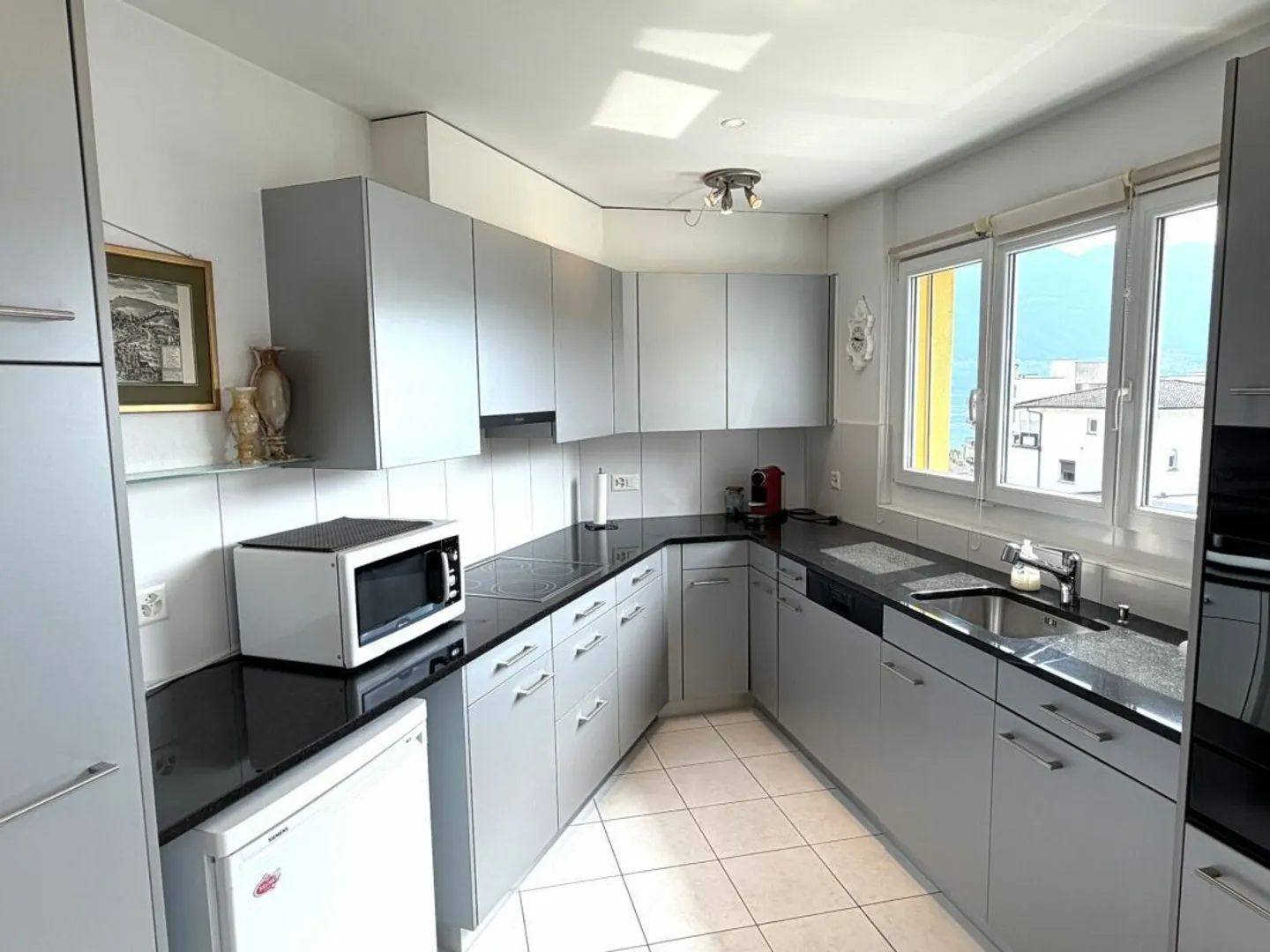 Appartement Charmant avec Vue sur le Lac - Photo 6 sur 11