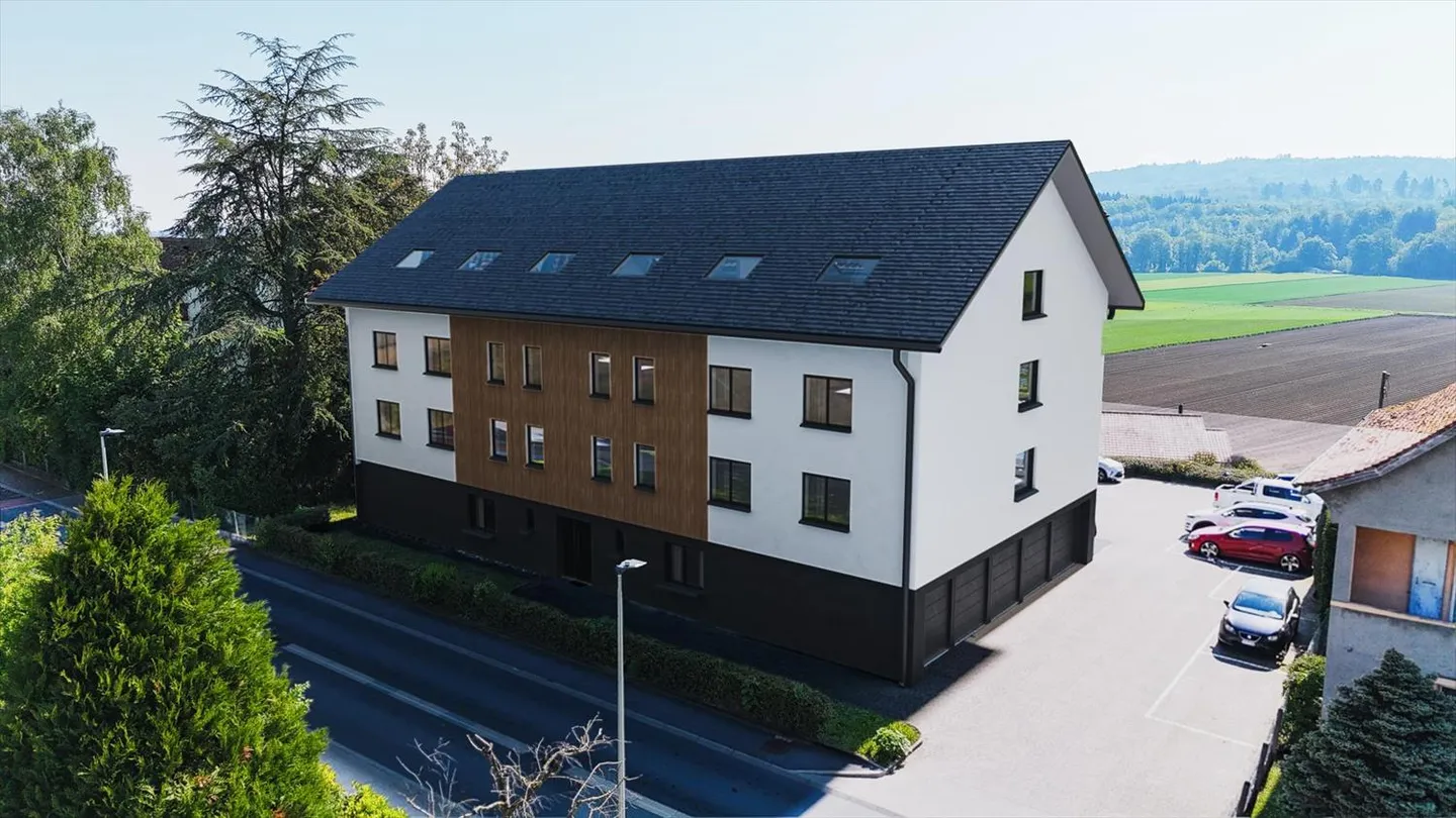 Fully renovated building in the heart of Fétigny - Photo 4 of 5