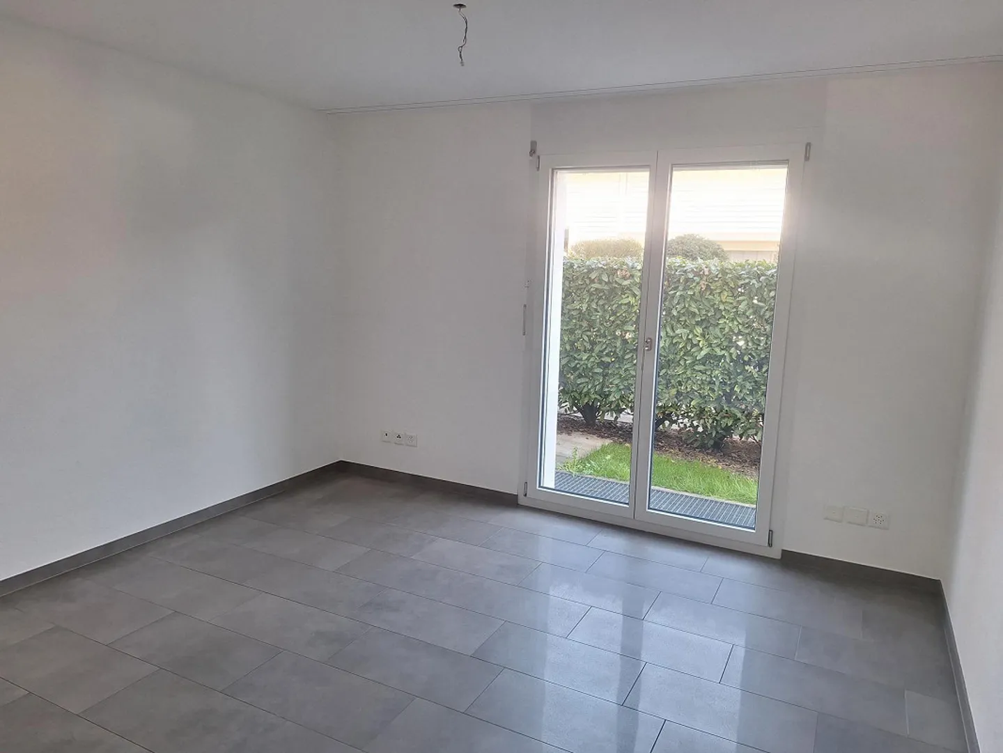 Attractive 3.5-room ground floor apartment with large garden - Photo 11 of 14